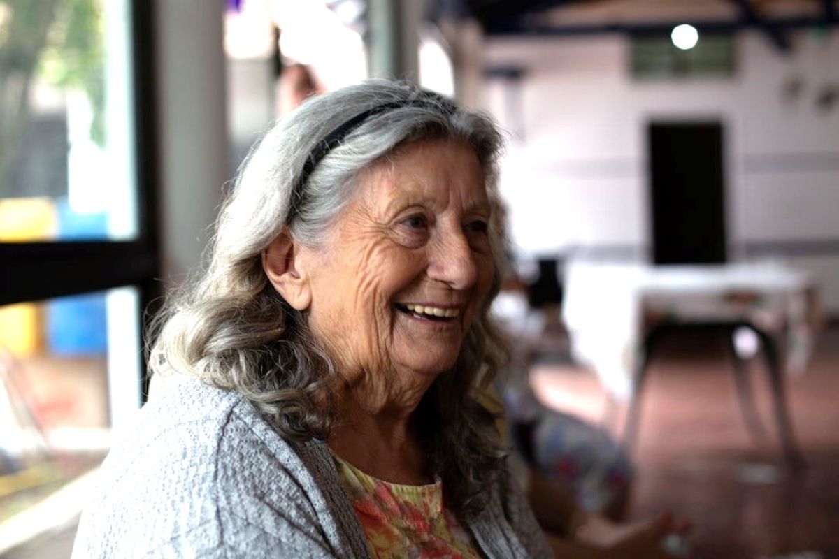 Senior citizen’s having fun in a dining room setting.