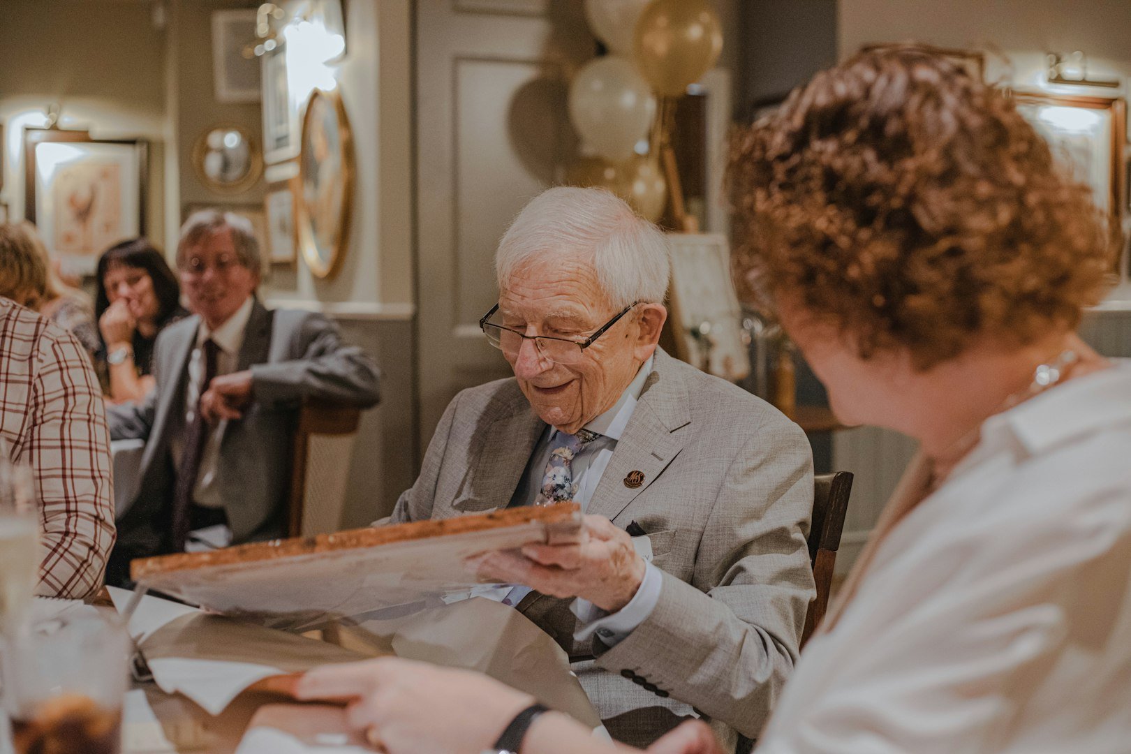 Senior citizen’s having fun in a dining room setting.
